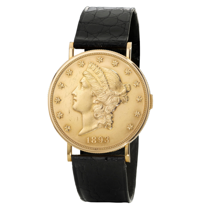 A gold coin watch with a leather strap