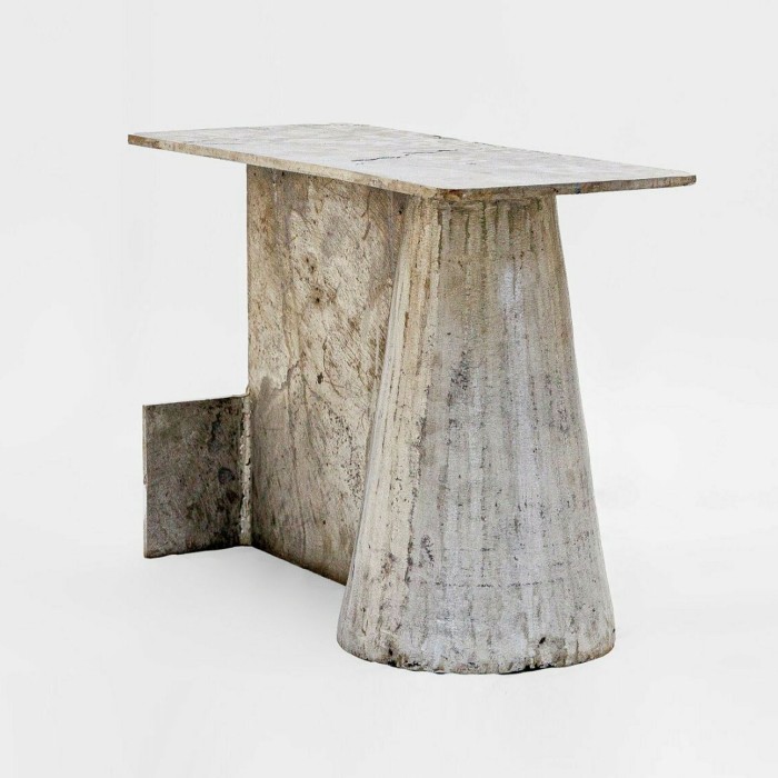 A cast-aluminium stool made from a cone and block