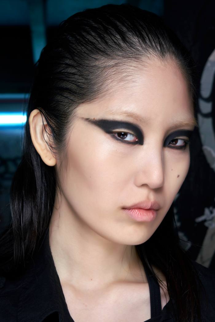 Dark make-up on a model for Rick Owens’ SS22 collection