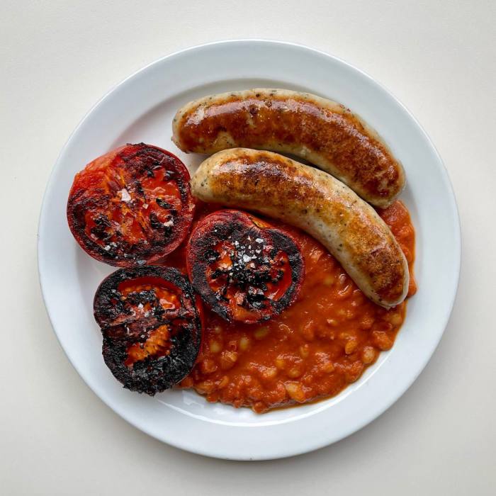 Two sausage, beans & grilled tomato at Norman’s Café