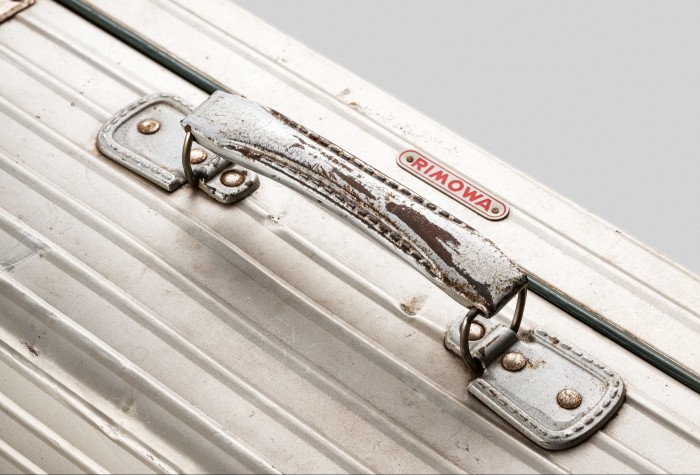 The Duralumin handle on this vintage 1960s Rimowa case is crafted to resemble stitched leather