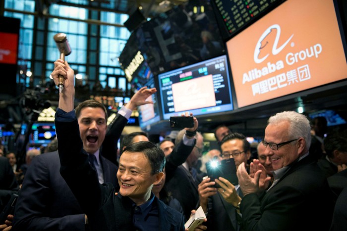 Jack Ma holds the gavel at the New York Stock Exchange in 2014. Mr Ma has not been seen in public since October last year