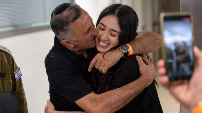 Rescued hostage Noa Argamani embraces her father