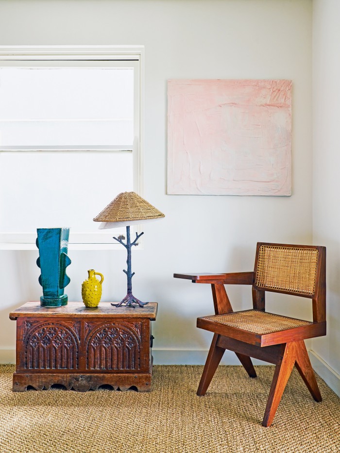 A Daimon Downey green vase and a Pierre Jeanneret desk chair