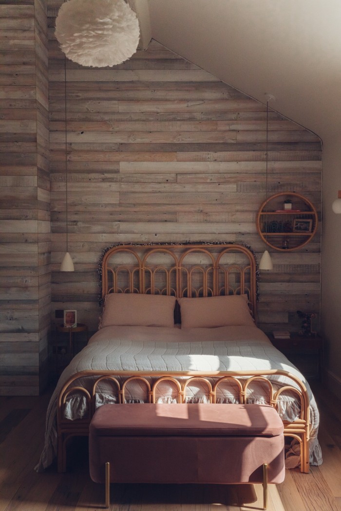 Reclaimed whitewashed cladding on a bedroom wall