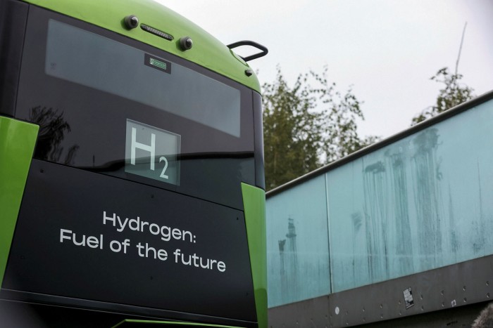 bus with a sign ‘Hydrogen Fuel of the Future’ on the windshield