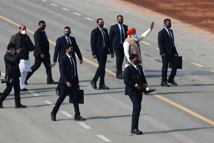 Narendra Modi, in red hat, celebrating India’s Republic Day on January 26