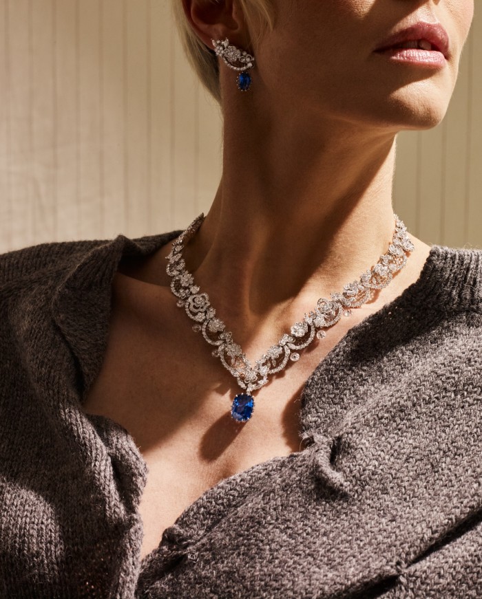 Dior Joaillerie white-gold, diamond and sapphire Dearest Dior necklace and earrings, both POA. Prada wool and cashmere sweater, £1,850