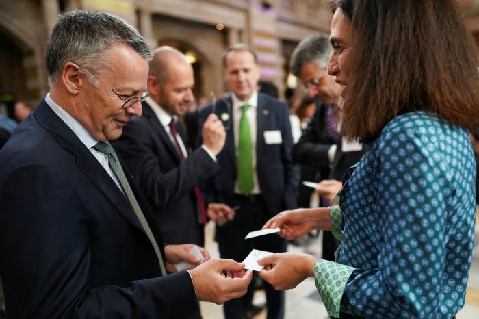 Business leaders mingle at COP26 after receiving Prince Charles’s seal, which recognises companies’ efforts to become more environmentally friendly