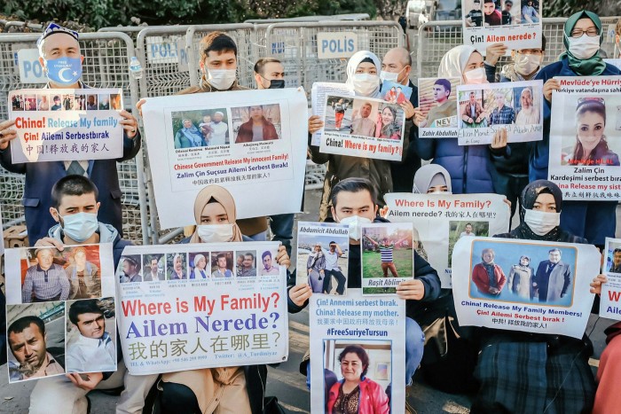 Members of the Muslim Uighur minority protest outside the Chinese consulate last December in Istanbul