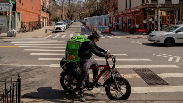 An Uber Eats courier delivers food in New York. The rise of the gig economy threatens to leave parts of the workforce with little security in retirement