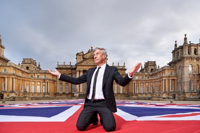 Maurizio Cattelan with his work Victory Is Not An Option at Blenheim Palace