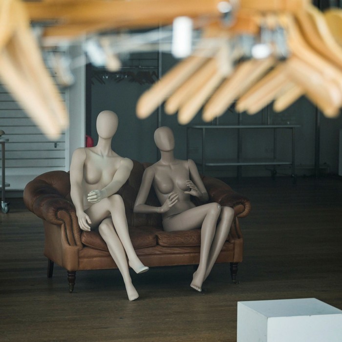 Mannequins sit in a permanently closed shop in London. In the City, the number of people visiting cafés, restaurants and retailers in the first week of October was less than one-third that of pre-pandemic levels