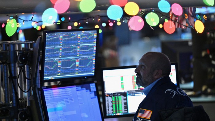 Traders work on the floor of the New York Stock Exchange 