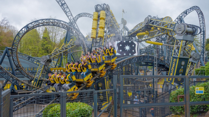 Visitors ride ‘The Smiler’ roller coaster at Alton Towers theme park