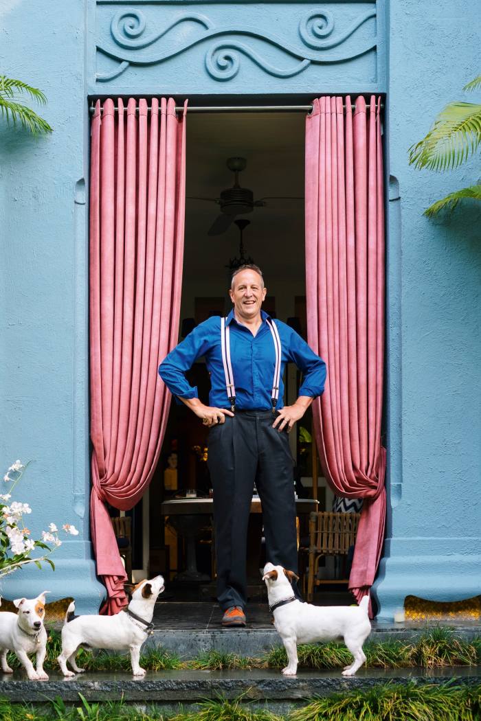 Bangkok-based architect and hotel-designer Bill Bensley with three of the seven Jack Russells he has owned