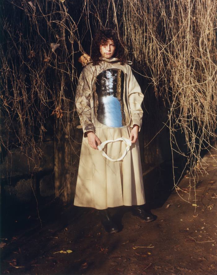 Loewe cotton and metal-plate trench coat, £7,900. Legres leather garden boots, £510