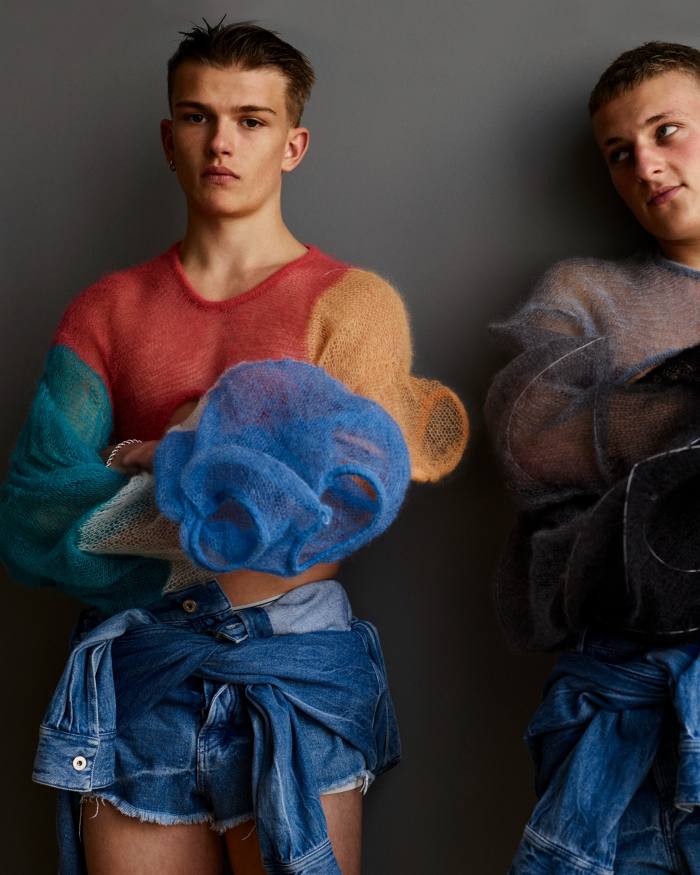 William Darby and Charlie Brock wear Loewe mohair jumpers and denim jumpsuits, all POA. William wears Bunney single gold earring, £1,710. Bracelet, model’s own