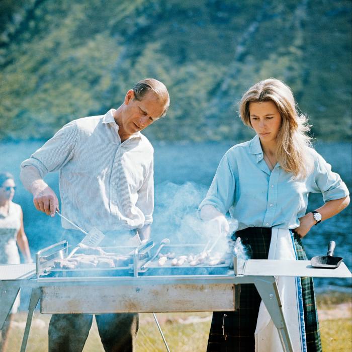 Prince Philip and Princess Anne at the barbecue at Balmoral in 1972
