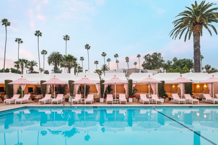 Dior’s coral loungers by the pool at the Beverly Hills hotel