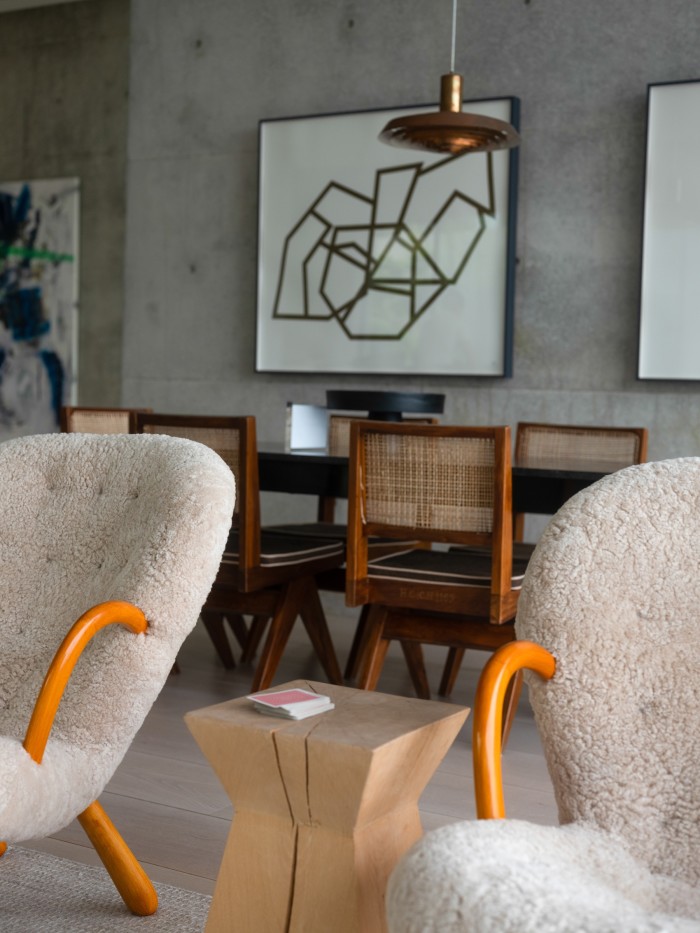 A selection of Joe Gebbia’s midcentury chairs in his Texas living room