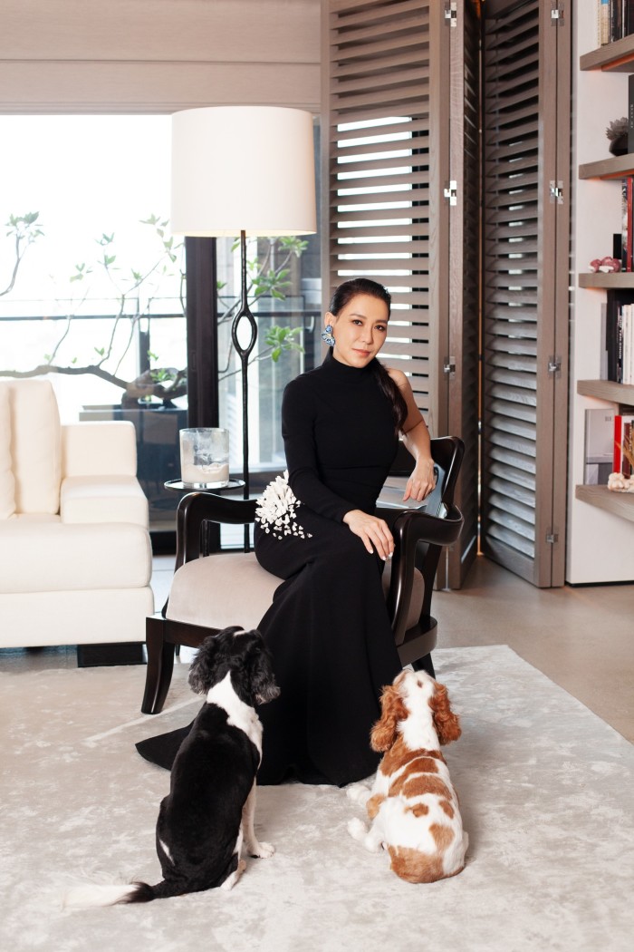 At home with her dogs, Wang Cai and Kooli