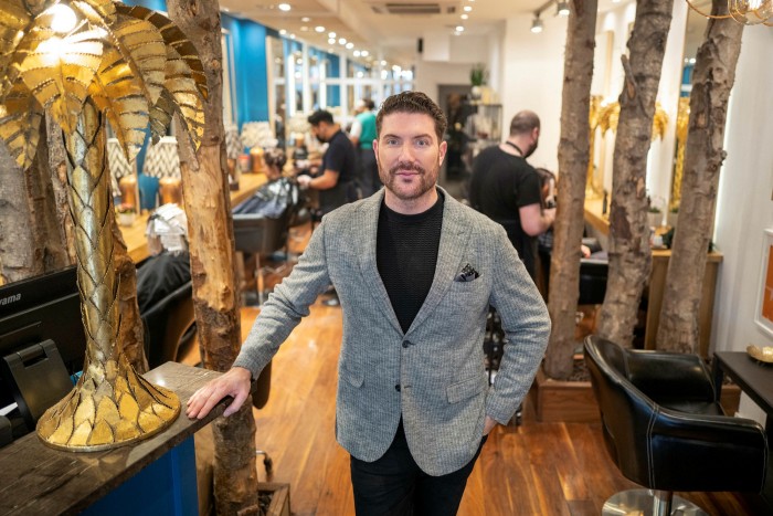 Edward James, owner of a high end hair salon of the same name  in his premises in Westminster