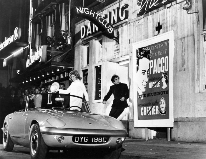 Monica Vitti and Terence Stamp with a Lotus Elan in the 1966 film Modesty Blaise