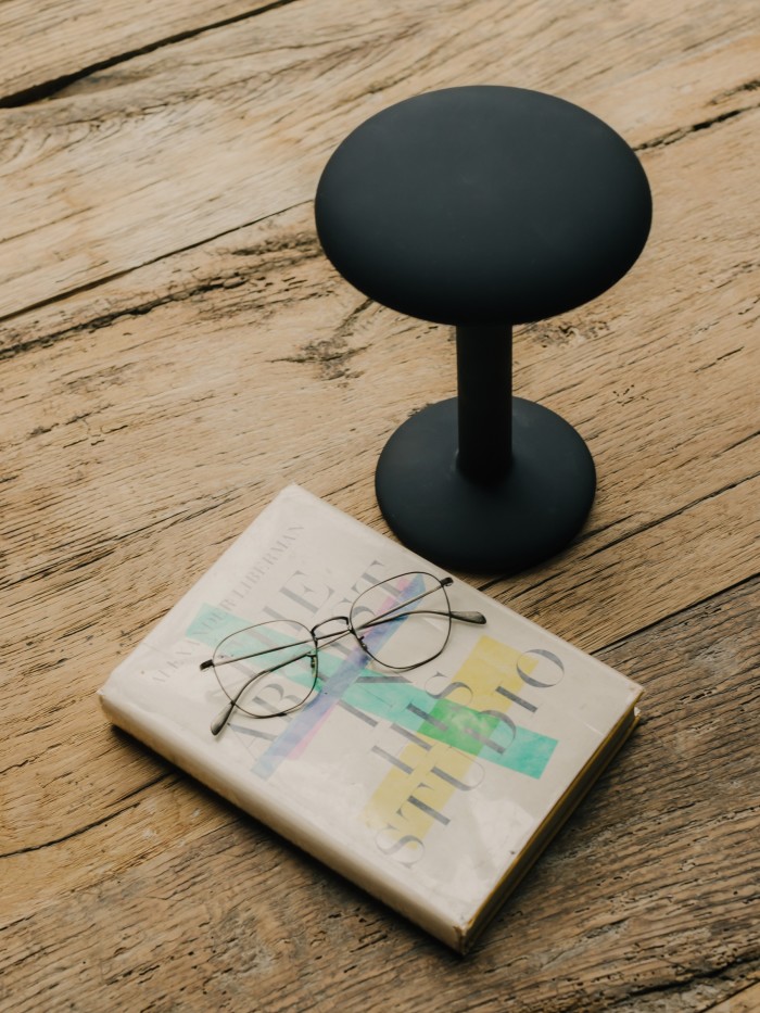 His Gustave table lamp for Flos and his Oliver Peoples glasses