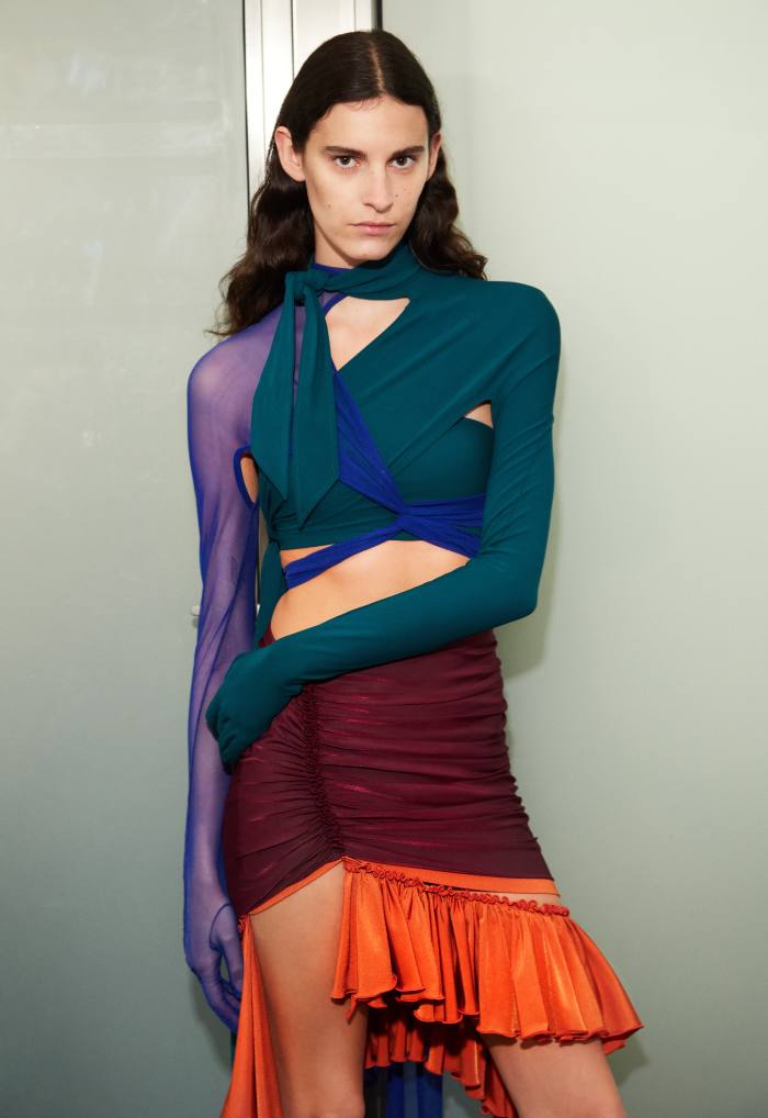 Mugler teal and royal blue harness gloves and dark-cherry and orange draped skirt, all POA