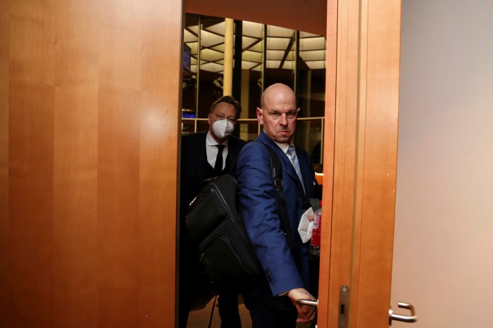 Thomas Eichelmann, former Chairman of Wirecard, walks out a door after giving testimony at the inquiry into the collapse of Wirecard