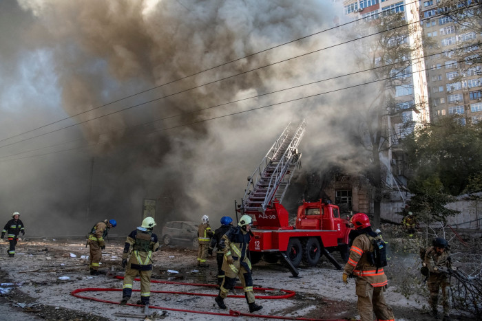 Firefighters battle a blaze in Kyiv
