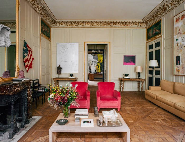 The Grand Salon, with made-to-measure coffee table by Festen, armchairs upholstered in Vescom fabric and a pair of late-19th-century English chairs. On the far wall hang Untitled, 2018, by Anne Imhof (left) and Little Electric Chair, 1964, by Andy Warhol