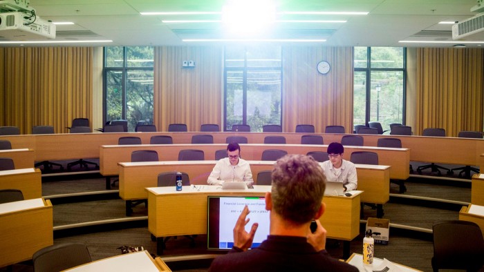 A professor at Berkeley’s Haas School of Business teaches mostly online students last March