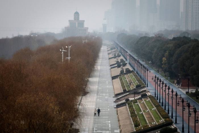 Two residents walk in an empty Jiangtan park on January 27 2020 in Wuhan. Fang Fang’s diaries, capturing how worry crept into everyday life, struck a chord with readers across China