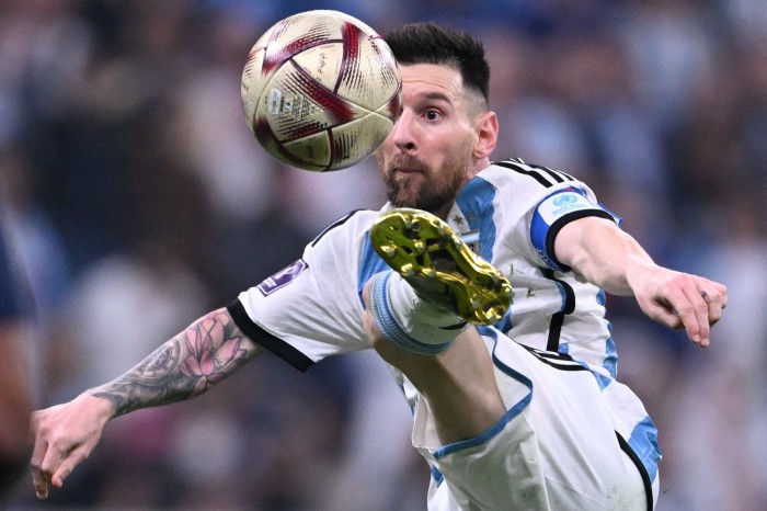 Lionel Messi, long endorsed by the German group, kicks an Adidas match ball during  the World Cup final in Qatar
