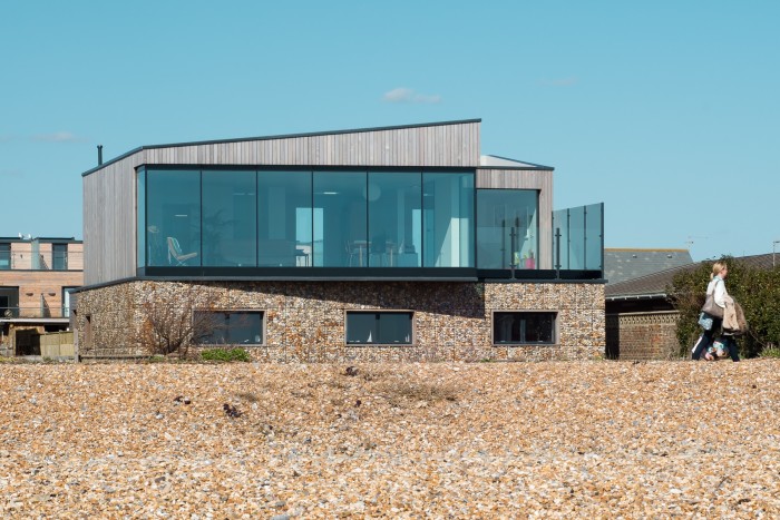 ABIR Architects designed this home in Shoreham-by-Sea with all the living spaces on the top floor