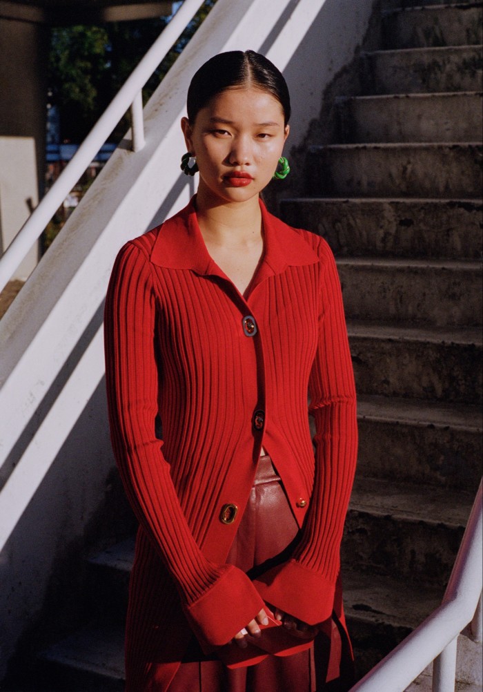 Lanxiang Vermeulen is a student of media design in Amsterdam, whose hobbies include badminton and photography. Bottega Veneta cotton/silk shirt, £2,185, calfskin bag, £1,520, and nappa-leather earrings, £400. Akris leather Carmin trousers, £2,125