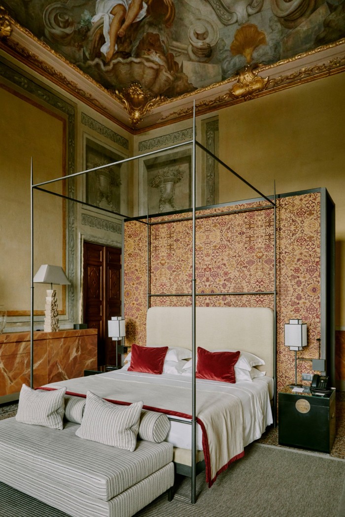 The Quattro Fiumi (Four Rivers) Suite at Palazzo Durazzo, with 17th-century frescoes and fabrics from Pierre Frey
