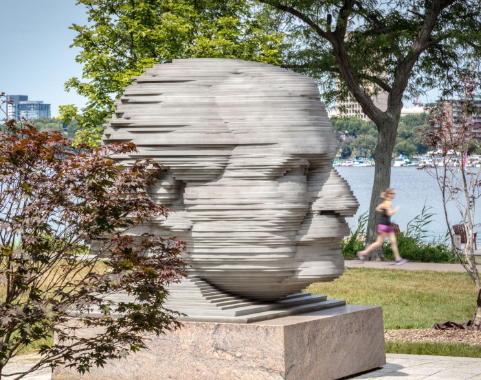  The Arthur Fiedler Memorial – a large sculpture of a man’s head – by the Charles river footpath in Boston 