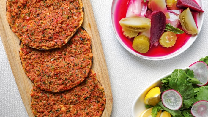 At 29, in the Ulus area of Istanbul, lahmacun is served with rocket, radish and lemon