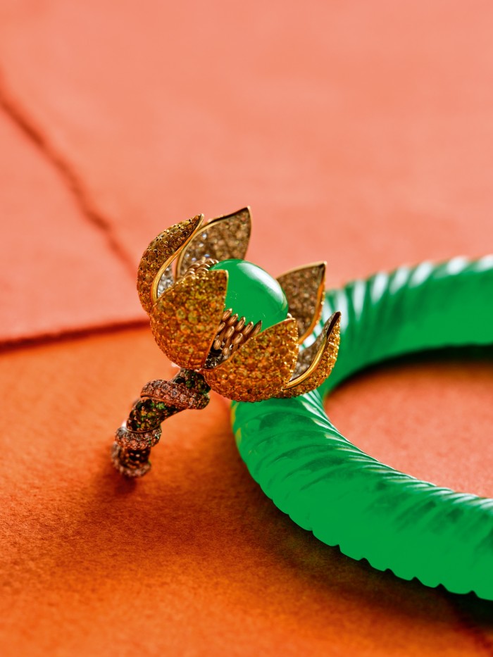 Anna Hu jadeite, gold, diamond and tsavorite Celestial Lotus Jade ring, and Asprey jadeite Twisted Spiral bangle