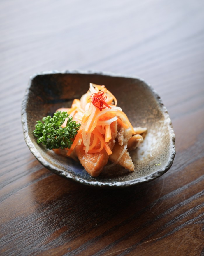 A dish of sakana nanban - sea bass, bream and salmon deep-fried and marinated with vegetables and vinegar - at Jin Kichi