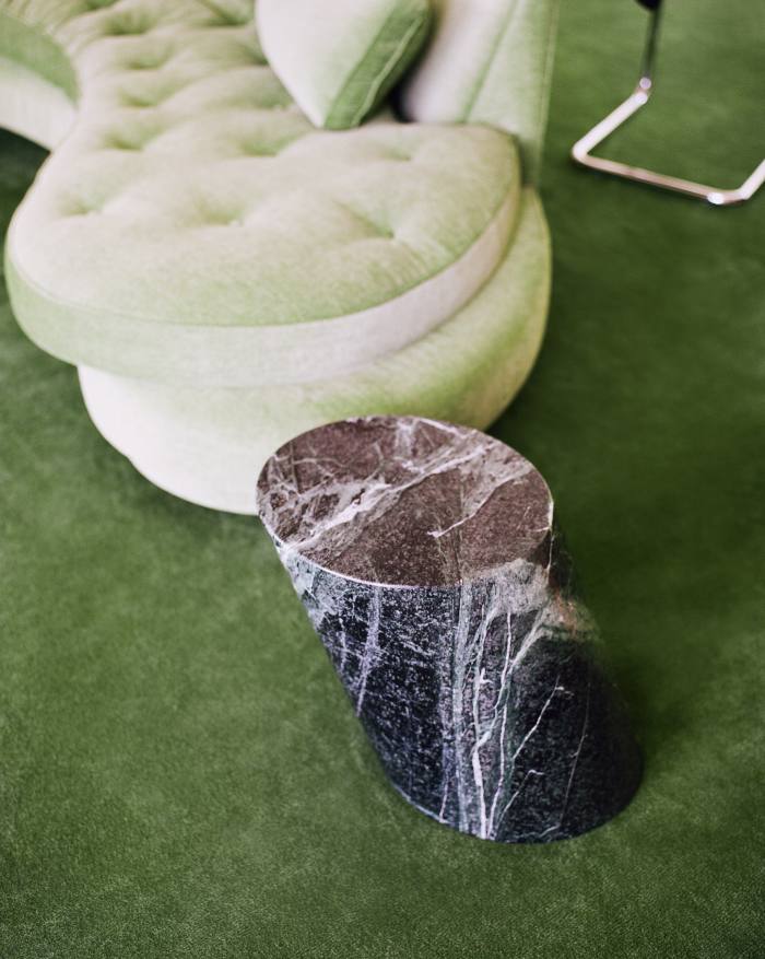 A marble side table by Lucia Mercer for Knoll