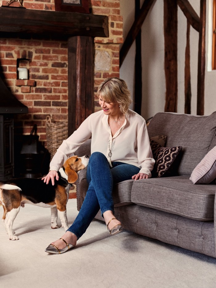 Sara Prentice at home near Maidstone, with Teddy, the family beagle