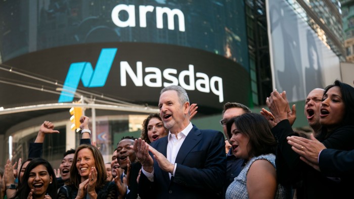 Rene Haas, chief executive of Arm, and others at the Nasdaq stock exchange  