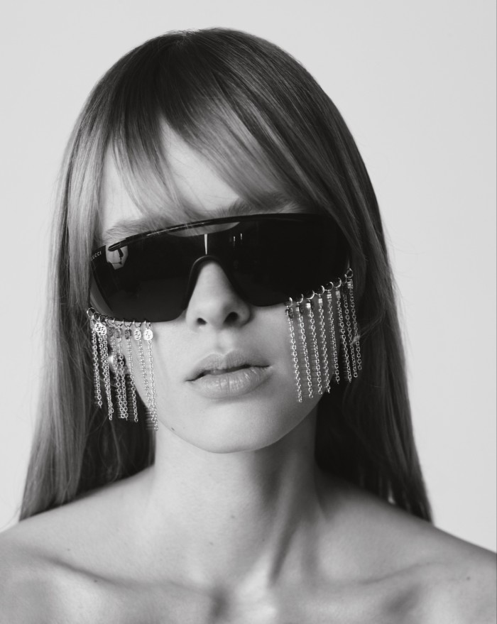 Gucci metal-fringed acetate sunglasses, £1,830. Chanel metal and crystal strass earrings (just seen), £1,360