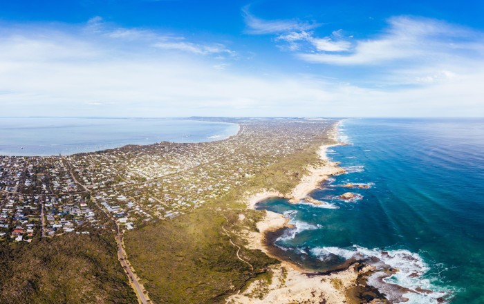 An aerial shot of the Mornington Peninsula, surrounded by sea