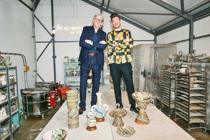 Paul Smith (left) and Henry Holland at Holland’s east London ceramics studio, with Holland’s plates, from £145, vases, from £295 to £3,300, chalices, from £795 to £2,300, and (back left) Up table lamp, £2,300