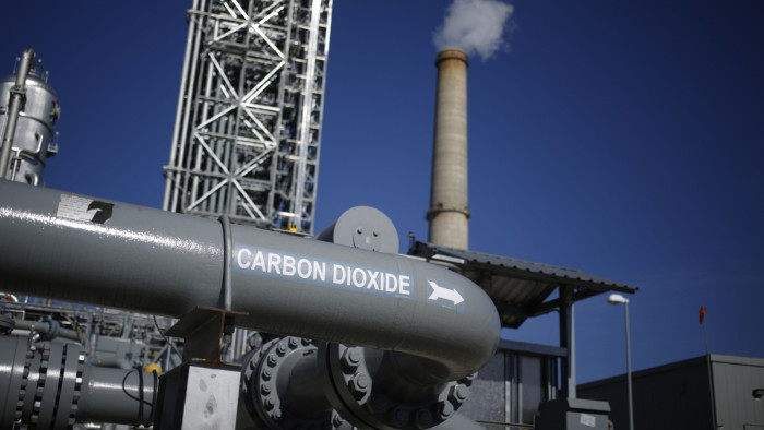 A pipe installed as part of the Petra Nova Carbon Capture Project carries carbon dioxide captured from the emissions of the NRG Energy generating station in Thompsons, Texas